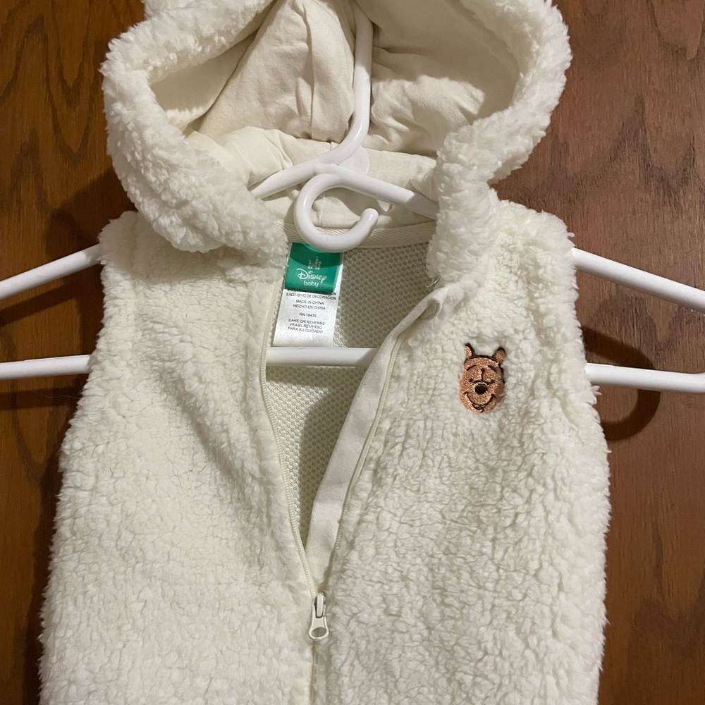 Disney Winnie the Pooh vest with ears on hood.